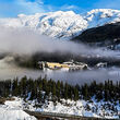Banks of clouds above and below the Ascot mill on a winter day in BC.