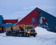 A truck loaded with Red Dog concentrates leaves the mill during the winter.