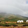 A rainbow shines down on Rockhaven's Klaza camp in the Yukon.