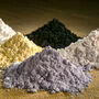Piles of praseodymium, cerium, lanthanum, neodymium, samarium, and gadolinium.