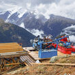 A drill tests for metals from atop a mountain ridge in BC’s Golden Triangle.