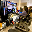 A Canadian First Nation girl drives a virtual mining truck.