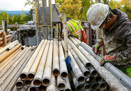 Driller removes core from a drill tube at the Donlin Gold project in Alaska.