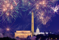 Fireworks over the Lincoln Memorial, Washington Monument, and Capitol Building.