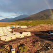 Rainbow next to a large Quonset tent camp on Alaska’s Seward Peninsula.