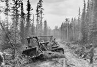 Army Corps. constructing Alaskan Highway in 1942.