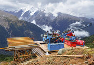 A drill tests for metals from atop a mountain ridge in BC’s Golden Triangle.