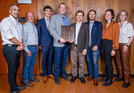 Snowline representatives receiving the Leckie environmental stewardship award.