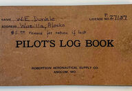Wesley Earl Dunkle's flight logbook at the Alaska Aviation Museum.