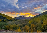 Sunset on the horizon over the mountains at White Gold’s project in Yukon.