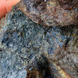 High-grade sample with blue and gold-colored copper-silver-zinc minerals.