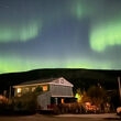 Bright green Aurora above Klondike Gold’s headquarters in Dawson City.