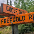 Mount Freegold Road sign Dawson Range gold copper district Yukon