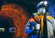 Underground American miner covid 19 mask great economic revival mining