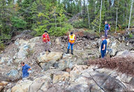 Geologists inspecting an outcrop on Onyx Gold’s King Tut property.