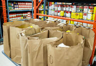Sacks of groceries by Food Bank Society of Whitehorse Victoria Gold donation