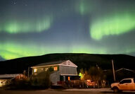 Bright green Aurora above Klondike Gold’s headquarters in Dawson City.
