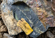 Glove offers perspective of the much larger copper-rich rock discovered at Nico.