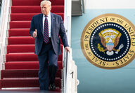 President Donald Trump gives thumbs up as he exits Air Force One