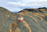 Drill pad on the ridge of a rocky hill at Sitka Gold Corp.'s RC Gold project.