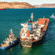 A ship loaded with iron ore mined at Mary River in Nunavut leaves Milne Inlet.