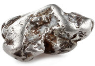 Close up of a silver colored platinum nugget found near Goodnews Bay.