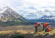 Geologists inspecting geology on slope at Fireweed’s Macmillan Pass project.