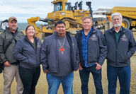 Mining executives and Tetlin Village chief at the Manh Choh gold mine in Alaska.