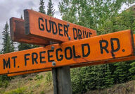 Mount Freegold Road sign Dawson Range gold copper district Yukon
