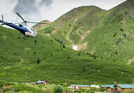 A helicopter flying into ATAC Resources' Rackla Gold property camp.