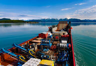Barge drills mineral exploration equipment Johnson Tract gold deposit Alaska