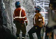 Two miners underground at the Greens Creek silver mine in Alaska.
