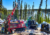A driller tests for gold as the snow melts on a spring day in Alaska.