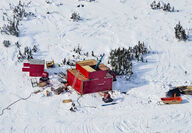 Aerial view of drill rig testing for gold during the winter.