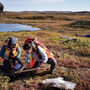 Three geologists collect soil samples at a Blue Star Gold project in Nunavut.
