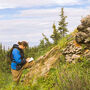 A geologist surveying an outcrop at the Klondike District gold project.