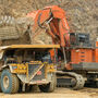 Excavator loads gold-rich ore into a truck at Kinross Alaska's Fort Knox Mine.