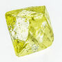 A 151.6-carat gem-quality yellow diamond recovered from a northern Canada mine.