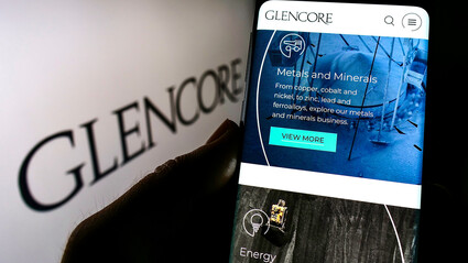 Smartphone displaying Glencore’s metals and minerals webpage.