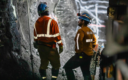 Two miners underground at the Greens Creek silver mine in Alaska.
