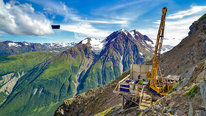 A drill rig on a mountainside at the Palmer mine project in Alaska.