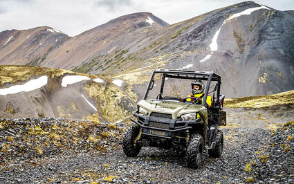 Polaris ATV at road accessible Macmillan Pass zinc project Yukon Canada