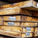 Stack of wooden drill core boxes at Giga Metals’ nickel-cobalt project in BC.