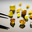 A collection of uncut yellow diamonds collected from a project in Nunavut.