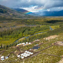 A rainbow seen in the background of Yukon’s Selwyn Basin.