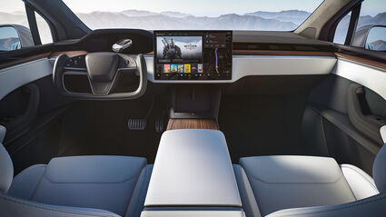 Infotainment and navigation system interface in a Tesla Model X EV.