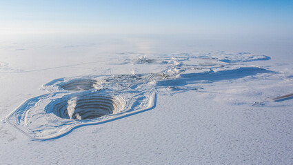 An aerial shot of the Diavik Diamond Mine on a sunny winter day.