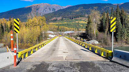 View across a single-lane bridge on a fall day in BC’s Golden Triangle.