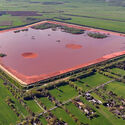 A bauxite residue or red mud storage pond in Stade, Germany.
