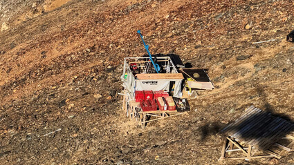 Drill tests for copper and gold on a heavily mineralized mountain slope in BC.